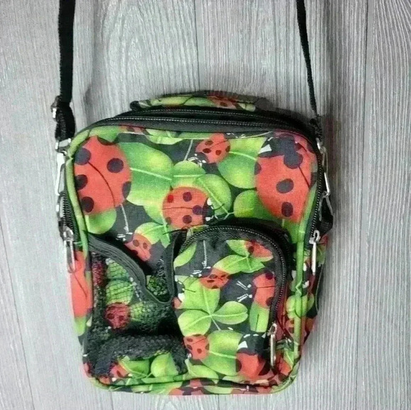 Lady Bug crossbody travel bag with water bottle compartment. Clean. - Picture 8 of 8